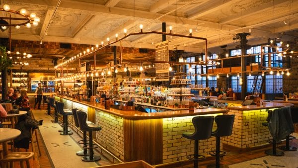 bar seats near bartender counter in restaurant