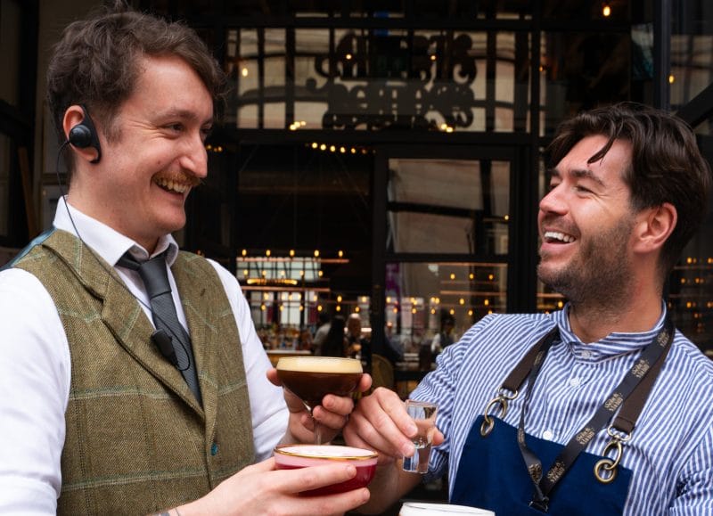 staff holding drinks