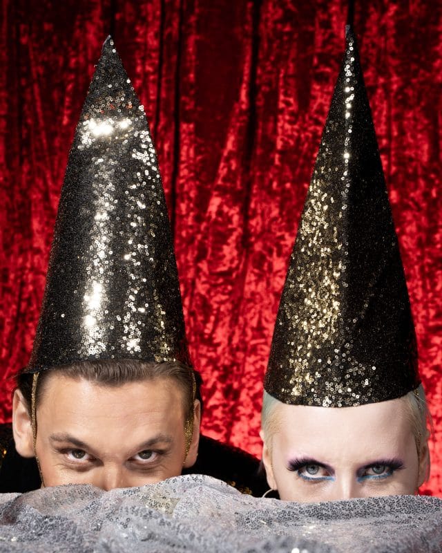 people wearing christmas elves hats