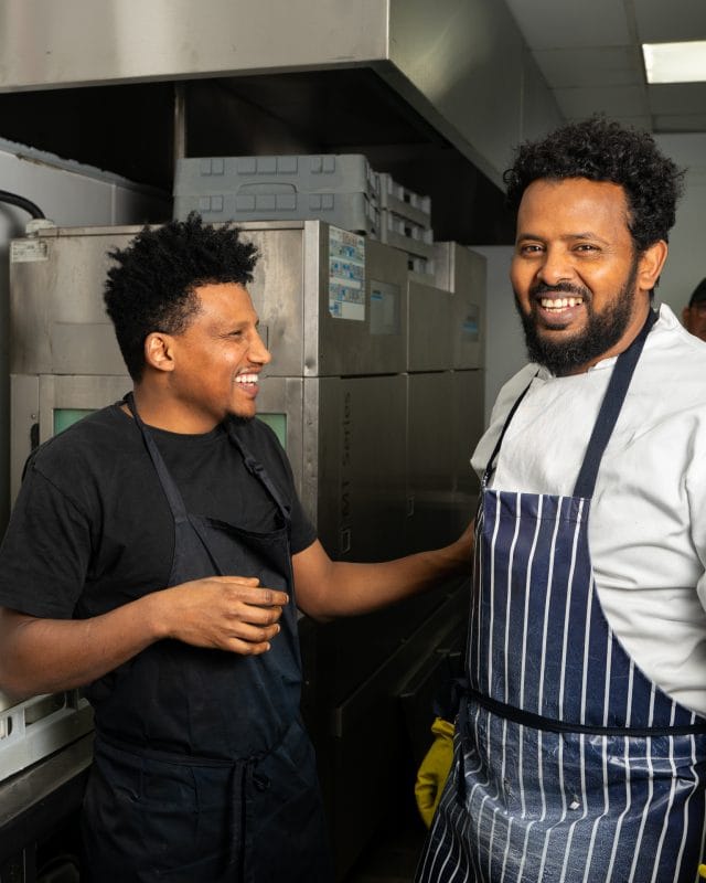 kitchen staff interacting in the kitchen